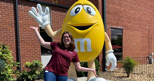 Mackenzie Sanders with giant M&M candy